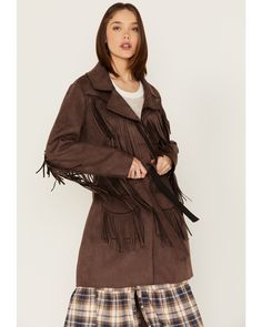 Model is 5'10" wearing a size medium. Solid pattern. Self-tie waist belt. Western yokes. Notched lapel. Fall Outerwear With Belt Loops, Fringe Coat, Contemporary Western, Belt Western, Fringe Coats, The Untamed, Suede Fringe, Solid Pattern, Outerwear Women