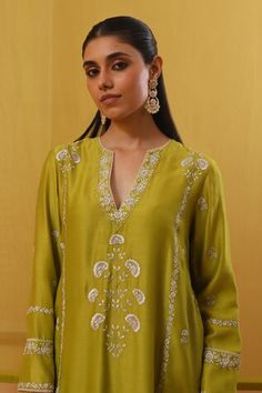 Lime green full sleeves A-line kurta with Bahar silk thread embroidery, highlighted with zari and sequins. Paired with a pant and an embroidered dupatta. - Aza Fashions Long Sleeve Gota Work Dresses For Eid, Eid Long Sleeve Dress With Gota Work, Long Sleeve Dresses With Gota Work For Eid, Eid Long Sleeve Top With Dupatta, Long Sleeve Tops With Dupatta For Eid, Green Long Sleeve Kurta For Transitional Season, Festive Long Sleeve Tunic With Zari Work, Festive Long Sleeve Green Kurta, Pista Green Anarkali Kurta With Long Sleeves