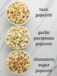 three bowls filled with different types of popcorn