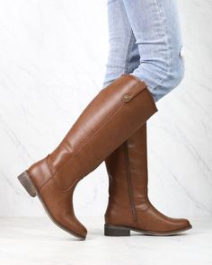 Amazing brown tone tall riding boots with inner side zip closure for easy on/off. dark brown tan heels: 1.25" imported fits true to size Brown Knee-high Boots For Fall, Brown Wide Calf Knee-high Boots For Riding, Casual Brown Knee-high Boots For Fall, Brown Winter Riding Knee-high Boots, Brown Wide Calf Knee-high Boots With Zipper, Brown Wide Calf Boots For Fall, Wide Calf Riding Knee-high Boots For Winter, Classic Brown Knee-high Riding Boots, Classic Brown Knee-high Boots For Riding