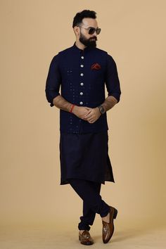 Important Instructions : We request you to kindly calculate the processing time of your order  after the mutual confirmation on Bespoke measurements between us has taken place (either via message , e mail or form) "Crafted with Passion in India; loved by men across the USA, Canada, Europe" Product Specifications : Material: Chikankari Silk Color: Navy Blue Jacket with Navy Blue Kurta Pajama Collar type: Mandarin Jawahar Jacket With 6 Buttons in Front Package contents: 1 Half Jodhpuri Jacket + 1 Blue Kurta For Puja And Festivals, Unstitched Blue Nehru Jacket With Dabka, Blue Unstitched Nehru Jacket With Dabka, Blue Kurta For Puja With Traditional Drape, Blue Traditional Drape Kurta For Puja, Traditional Blue Nehru Jacket With Chikankari Embroidery, Traditional Blue Nehru Jacket For Eid, Blue Nehru Jacket With Chikankari Embroidery For Festivals, Indigo Traditional Wear For Diwali