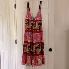 Anthropologie Mixed Print Tiered Flowing Midi Dress. Florals And Plaid Such Pretty Prints And The Fabric Is So Nice Lined Very Comfy And Easy To Wear Looks So Flowy And Pretty On The Prints And Fabrics Are Simply Gorgeous On This I Could Wear Flowy Midi Dresses Daily Size M Tags And Labels Removed But The Dress Is Nwot See Photos For Measure Take A Look At My Other Items Lots Of Great Things And Always Adding More Pleated Multicolor Midi Dress For Summer, Multicolor Pleated Midi Dress For Summer, Multicolor Pleated Sleeveless Midi Dress, Multicolor Sleeveless Pleated Midi Dress, Sleeveless Multicolor Pleated Midi Dress, Spring Pleated Midi Sundress, Pink Pleated Vacation Dress, Spring Midi-length Pleated Sundress, Spring Midi Length Pleated Sundress