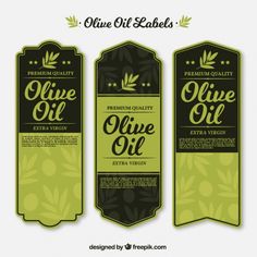 three olive oil labels with green leaves