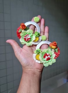 Handmade Beautiful Oversized Orange and Lime Green Floral Hoop Earrings. These stunning handmade earrings feature oversized hoops adorned with vibrant orange and lime green floral designs. Perfect for adding a bold pop of color to any outfit, they exude a lively and playful summer vibe. Despite their size, these earrings are lightweight, making them comfortable to wear all day long. The bright, cheerful colors make them a must-have accessory for the summer season, adding a touch of nature-inspir Handmade White Hoop Flower Earrings, Bohemian Earrings With Handmade Flowers For Beach, Bohemian Handmade Flower Earrings For Beach, Bohemian Beach Earrings With Handmade Flowers, Green Flower-shaped Earrings For Beach, Green Flower-shaped Beach Earrings, Handmade Hoop Flower Earrings For Summer, Handmade Summer Flower Hoop Earrings, Handmade Flower Hoop Earrings For Summer