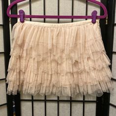 Nwt | Never Worn Forever 21 Size S/P Nude Color Tulle Ruffles Zipper Side / Hook Closure Lined Inside With Soft T Shirt Like Material Approximate Measurements Waist 14’ Length 12’ - 13’ #Forever21 #Tulleskirt #Summervibes #Festivalseason #Schooldance #Easterskirt #Poshmark Forever 21 Ruffled Mini Skirt For Summer, Forever 21 Ruffled Mini Skirt, Forever 21 Flowy Bottoms For Party, Forever 21 Ruffled Skirt For Spring, Forever 21 Flowy Party Skirt, Forever 21 Tiered Skirt For Spring, Forever 21 Tiered Skirt, Forever 21 Pleated Mini Skirt For Party, Forever 21 Fitted Mini Skirt With Ruffles