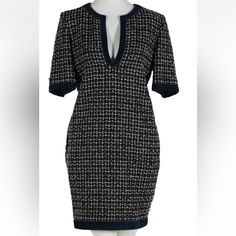 A Classic Chanel Paris French Designer Ladies Short Sleeve Tweed Sheath Dress. Features Blue Suede Leather Trim, With A V Neck Design, Lime Green, Blue And White Tweed, Accented With A Single Enameled Button At One Side Of The Dress. Made Of Wool, Silk And Lambskin. Retains Original Labels And A $3900 Price. Elegant V-neck Tweed Mini Dress, Fitted Tweed V-neck Mini Dress, V-neck Tweed Dress For Work, Elegant Short Sleeve Tweed Mini Dress, Fitted V-neck Tweed Dress For Formal Occasions, Elegant Tweed V-neck Dress, Elegant Blue Tweed Dress, Elegant Blue Tweed Dress For Formal Occasions, Fitted Tweed V-neck Dress