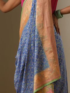 An exclusive Banarasi Handloom saree from Khinkhwab. Add a dash of your favorite color to your ethnic look with this beautiful Banarasi saree from our Birds of Paradise collection. The Saree is made of pure Georgette silk and has the illustrious birds motifs weave. Jaal weave is inherent to Banarasi weaving and this saree is the epitome of the craftsmanship of the renowned weavers of Banaras. Slub Silk Pre-draped Saree With Zari Work For Puja, Chanderi Meenakari Pre-draped Saree For Navratri, Traditional Festive Slub Silk Pre-draped Saree, Bollywood Style Jamawar Pre-draped Saree For Diwali, Multicolor Slub Silk Pre-draped Saree With Dupatta, Banarasi Silk Pre-draped Saree With Zari Weaving, Festive Pre-draped Saree With Zari Weaving In Slub Silk, Navratri Katan Silk Pre-draped Saree With Meenakari, Navratri Meenakari Tussar Silk Pre-draped Saree