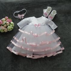 Lara 3 pieces, dress + headband + shoes - A beautiful dress for your little princess + headband and shoes - All made with love, simply stunning and graceful - Condition: New - Material: 100% polyester decorated with an elegant bow **- Available Sizes - Gr. 56 - Gr. 62 - Gr. 68 - Gr. 74 - Gr. 80 - Gr. 86 - Gr. 92 - If you need a different size, just write to us - Please specify size **Please note - Sizes: +/-2cm tolerance by manual measurement. - The colors in the pictures are never 100% like the White Elegant Baptism Dress For First Birthday, Elegant White Baptism Dress For First Birthday, Elegant White Dress For First Birthday, White Princess Style Baptism Dress For First Birthday, White Princess Baptism Dress For First Birthday, White Princess Style Baptism Dress For Summer, White Princess Baptism Dress For Summer, White Summer Tutu Dress For First Communion, White Spring Tutu Dress For Baptism