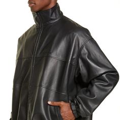 Balenciaga Doesn't Do Anything By Half Measures, It's Always Oversized. This Black Lambskin Panelled Bomber Jacket Is A Prime Example And Its Silhouette Can Be Manipulated With The Drawstring Hem And A Belt Around The Waist. Featuring A Stand-Up Collar, A Front Zip Fastening, An Embroidered Logo To The Front, Long Sleeves, Elasticated Cuffs And A Drawstring Hem. Designer Leather Jacket For Spring Streetwear, Luxury Spring Outerwear For Streetwear, Luxury Spring Streetwear Outerwear, Designer Oversized Black Outerwear, Designer Black Oversized Outerwear, Black Designer Oversized Outerwear, Balenciaga Jacket, Balenciaga Men, Painting Leather