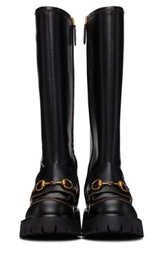 The Horsebit detail is a key Gucci motif, appearing throughout the house's collections. It can be seen to the front of these boots, speaking to the equestrian inspiration behind the pair.Signature Horsebit detailPanelled designRound toeSide zip fasteningKnee-highChunky rubber soleLow block heel ~1.73"Composition: Leather 100%Sole: Rubber 100%Lining: Leather 100%Made in Italy Designer Gucci Boots For Fall, Gucci Luxury Boots For Fall, Gucci Calf Leather Boots For Fall, Gucci Calf Leather Boots With Horsebit Detail, Gucci Round Toe Boots For Workwear, Gucci Boots For Workwear, Leather Gucci Boots With Horsebit Detail, Gucci Leather Boots With Horsebit Detail, Designer Gucci Boots For Work