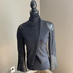 Beautiful And Classy Jacket Made Of Buttery Soft Black Leather And Grey Wool. Gray Long Sleeve Biker Jacket For Winter, Fitted Leather Jacket For Layering, Fitted Gray Blazer For Fall, Black Leather Jacket For Winter Layering, Black Leather Jacket For Winter, Winter Leather Jacket For Layering With Long Sleeves, Winter Black Leather Jacket, Edgy Fitted Blazer For Fall, Classy Jacket