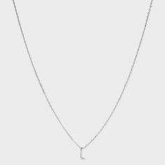 Enjoy a simple yet elegant look by accessorizing with the Sterling Silver Small Polished Initial Pendant Necklace from A New Day™. This silver-tone small pendant necklace features a cable chain with an initial dangling down at the center for a beautiful look. Complete with a pouch for convenient storage or gifting, this initial pendant necklace closes with a spring ring clasp closure and comes with an extender chain for a perfect fit around the neck. A New Day™: Style that goes wherever you do. Classic Silver Name Necklace With Delicate Chain, Classic Silver Initial Necklace With Adjustable Chain, Silver Dainty Initial Necklace For Formal Occasion, Classic Silver Initial Necklace With Delicate Chain, Pouch Craft, M Necklace, Target Gifts, Sterling Silver Initial, Initial Pendant Necklace