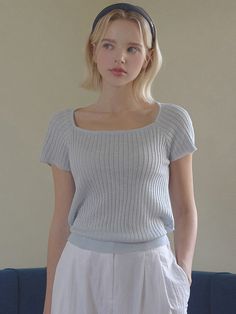 This is a feminine and casual top by TWEE that is made out of high quality and sturdy material. With distinctive mood of the design and comfortable wear, you can style it for your casual daily outfit.- Square neckline and ribbon strap on the back- Front and back unbalanced length- Casual and feminine mood Chic Ribbed Cotton Top, Chic Ribbed Knit Top With Square Neck, Chic Everyday Knit Top With Scoop Neck, Chic Scoop Neck Knit Top For Everyday, Casual Ribbed Square Neck Top, Chic Everyday Scoop Neck Knit Top, Stretch Knit Tops With Square Neck, Ribbed Scoop Neck Top For Day Out, Chic Knit Tops