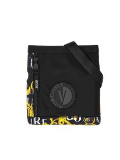 Versace Jeans Couture bag. Dimensions: L19 cm X H21 cm X P1 cmComposition: 95% Cotton, 5% Elastane Designer Shoulder Bag Pouch, Designer Satchel With Adjustable Strap In Pouch Shape, Designer Satchel Pouch With Adjustable Strap, Designer Rectangular Satchel With Logo, Designer Shoulder Bag With Logo, Designer Logo Satchel Bag, Designer Logo Shoulder Bag, Designer Shoulder Bag With Logo For Daily Use, Designer Crossbody Bag With Zipper Closure