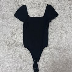 Revolve Black Square Neck Bodysuit Size Small In Great Condition. Brand New”Yummie” Casual Black Short Sleeve Bodysuit For Night Out, Black Fitted Short Sleeve Bodysuit, Black Stretch One-piece Top, Black Short Sleeve Bodysuit For Summer Night Out, Trendy Black One-piece Bodysuit, Black Casual One-piece Bodysuit, Casual Black One-piece Bodysuit, Dark Skin Boys, Square Neck Bodysuit