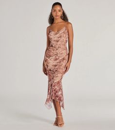 Turn heads in this floral mesh midi dress at parties and on dates! Featuring a flirty v-neckline and bungee spaghetti straps, and a bodycon silhouette that accentuates your curves. The asymmetrical-cut ruffled midi-length hem adds a touch of playfulness to the elegant watercolor floral print in airy mesh-lined fabric. Complete the look in a cute open-front cardigan and heels!Fit & FeaturesSleeveless V-necklineBungee spaghetti strapsBodycon silhouetteAsymmetrical-cut ruffled midi-length hemWa Fitted Floral Print Mesh Dress For Party, Summer Mesh Dress With Spaghetti Straps For Prom, Chic Spring Mesh Dress With Spaghetti Straps, Flirty Ruched Mesh Dress For Spring, Flirty Floral Print Midi Dress For Party, Chic Floral Print Slip Dress For Party, Elegant Spring Mesh Dress With Spaghetti Straps, Elegant Mesh Dress With Spaghetti Straps For Spring, Flirty Slip Dress For Spring Prom