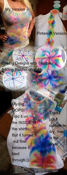 a woman standing in front of a table covered with different colored paper and an umbrella