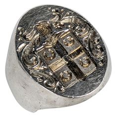 Massive Antique Sterling Signet Ring from the 1940's for instant old world vibes. Elegant armorial crest design which is crisp and unscratched. Super heavy quality sterling shank. Large imposing face measures 7/8" x 5/8". Size 9. Great for men or women, 1940's USA. Crest Design, Signet Ring, Old World, Jewelry Rings, Bracelet, Ring, Quick Saves, Design, Jewellery Rings