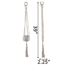 an image of a pair of tassels with measurements