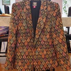 Multi Colored Three Button Sleeve Notched Collar Fully Lined Tailored Multicolor Blazer For Fall, Multicolor Notch Lapel Blazer For Fall, Fall Multicolor Single-breasted Blazer, Formal Orange Blazer For Fall, Elegant Multicolor Winter Blazer, Elegant Multicolor Blazer With Notch Lapel, Orange Long Sleeve Formal Blazer, Elegant Long Sleeve Orange Blazer, Elegant Multicolor Blazer For Fall