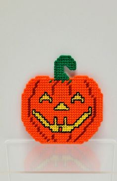 Handmade. No stains or pulls Please examine all photos for condition of item. Thank you for looking! Halloween Plastic Canvas, Beads Designs, Plastic Canvas Patterns Free, Halloween Orange, Orange Pumpkin, Perler Beads Designs, Plastic Canvas Patterns, Pumpkin Orange, Canvas Patterns