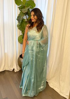 Festive Sheer Organza Saree, Traditional Sheer Organza Saree, Green Fitted Pre-draped Saree For Summer, Festive Sheer Saree, Green Saree For Summer Party, Elegant Sheer Saree For Festive Occasions, Elegant Festive Sheer Saree, Green Summer Party Saree, Summer Party Green Saree