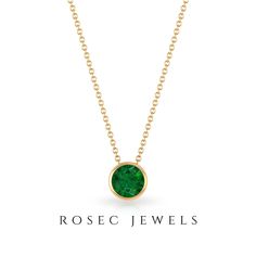 Product Details Introducing the Emerald Bezel Necklace, a graceful and elegant adornment for your beloved. This exquisite gemstone necklace showcases a round-shaped emerald set meticulously within a bezel, exuding sophistication and charm. Product Information SKU SHP-PENDANT082019730 Length 7 mm Width 7 mm Height 4.5 mm Weight 2.96 gm (Approximate) EMERALD INFORMATION No.of Stones 1 Pieces Total Weight 0.82 Carat (Approximate) Dimension(approx) Round-6X6 mm-1 Pcs Color Green Cut Brilliant Shape Luxury Green Round Pendant Necklace, Formal Round Emerald Necklace Fine Jewelry, Formal Round Emerald Necklace, Formal Emerald Necklace With Round Pendant, Formal Green Necklace With Round Stone, Green Round Stone Necklace For Formal Occasions, Classic Emerald Necklace For May Birthstone, Elegant Round Emerald Necklace For Anniversary, Formal Emerald Necklace With Bezel Setting