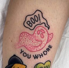 a tattoo with the words boo and you who? on it's leg, next to an image of a cartoon character