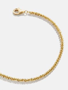 When it comes to the Avery 18K Gold Bracelet, less is more. A single 18K gold chain makes a statement and creates texture to revitalize your go-to look. Adjust the clasp to create your perfect fit and see how even simple styles can make an impression. Everyday Gold Chain Bracelet With Oyster Design, Everyday Yellow Gold Chain Bracelet With Oyster Detail, Everyday Yellow Gold Oyster Chain Bracelet, Gold Oyster Bracelet For Everyday Luxury, Yellow Gold Oyster Bracelet For Everyday Luxury, Sterling Silver Jubilee Bracelet In Yellow Gold Fine Jewelry, Yellow Gold Sterling Silver Jubilee Bracelet, Gold Jubilee Bracelet For Everyday Luxury, Everyday Luxury Gold Jubilee Bracelet