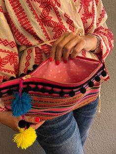 "♥Ethnic Pom Pom Purse, Hippie Bag, Rainbow Boho Purse, Christmas Gift For Her/Sister/Girlfriend/Mum, Valentine's Day Gift♥ ✪PLEASE LEAVE A VALID PHONE NUMBER AT CHECKOUT (MESSAGE TO SELLER), FOR THE SHIPPING CARRIER. THANK YOU. This very beautiful purse is made with a very lightweight handwoven fabric, a felt fabric for support and a pink lining fabric with daisies! The zipper is a YKK metal one with lovely handmade adjustable pom poms. The black pom pom hand stitched trim on the outside, gives Pom Pom Purse, Rainbow Boho, Tassel Purse, Hippie Bags, Straw Handbags, Small Boho, Handwoven Fabric, Boho Purses, Boho Bag