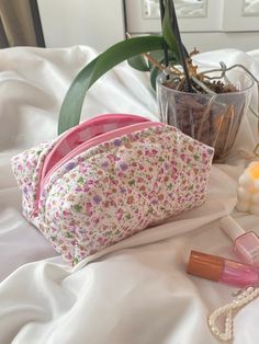 Handmade pink floral makeup bag inside: pink gingham pink zipper 🌸Size Small: 18 cm x 10 cm x 8 cm ( 7.09'' x 3.94'' x 3.15'' ) Medium:20cmx12cmx8cm(7.87''x4.72''x3.15'') Large: 22 cm x 12 cm x 10 cm (8.21" x 4.72" x 3.94") XL (travel bag): 25 cm x 16 cm x 12 cm (9.84" x 6.29" x 4.72") To see all sizes, you can look at the product on this link: https://www.etsy.com/listing/1312614891/makeup-bag-cosmetic-bag-lila-floral 🧸 Since the makeup bag is handmade, there may be slight deviations in its d Pink Floral Makeup, Womens Day Gift, Terry Makeup, Handmade Makeup Bag, Floral Makeup Bag, Candy Makeup, Floral Makeup, Handmade Makeup, Makeup Bag Travel