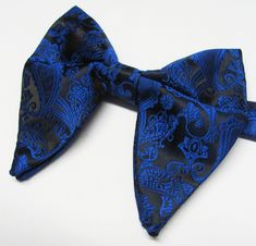 Beautiful pre-tied and adjustable double tiered banded bow tie Velvet Will adjust from 13" through 20" neck. Bow dimensions 3.25" x 4.5". Bow tie Always made by hand and to your special order. Weddings and groups are welcome. Blue Adjustable Bow Tie And Suit Accessories, Elegant Blue Adjustable Bow Tie, Blue Bow Tie With Butterfly Knot For Formal Events, Blue Adjustable Bow With Ties, Adjustable Blue Bow Ties, Adjustable Blue Bow With Ties, Formal Blue Bow Tie And Suit Accessories, Blue Bow Suit And Tie Accessories For Formal Occasions, Blue Formal Suit And Tie Accessories With Decorative Bow