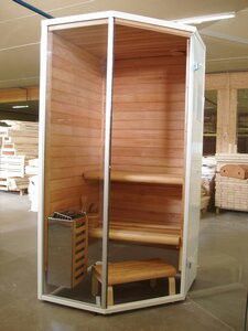 an indoor sauna is shown in the middle of a room