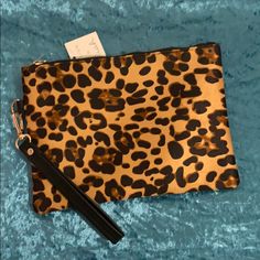 Leopard Print Wristlet. Leopard Print On One Side. Solid Black On The Other Side. 9 Inches X 6.5 Inches With A 6 Inch Wristlet Strap. Zipper Closure With An Inside Zippered Pocket. Nwt. Bundle To Save! Trendy Wristlet Clutch With Wrist Strap, Party Wristlet With Wrist Strap, Fashion Accessory Wristlet Clutch, The Other Side, Solid Black, Black Red, Leopard Print, Black And Red, Zipper