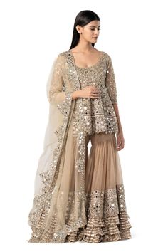 Buy Beige Net Embroidered Mirror Plunged V Embellished Short Kurta Sharara Set For Women by Abhinav Mishra Online at Aza Fashions. Glamorous Sets With Mirror Work In Chinon, Glamorous Embellished Palazzo Set For Wedding, Glamorous Chinon Sets With Mirror Work, Glamorous Sharara With Resham Embroidery For Navratri, Glamorous Resham Embroidered Sharara For Navratri, Glamorous Hand Embellished Sharara For Festivals, Glamorous Embellished Sharara For Eid, Glamorous Wedding Palazzo Set With Mirror Work, Glamorous Mirror Work Sharara For Eid