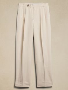 This relaxed pant is expertly cut with a wide leg and puddle hem in a beautiful linen-blend fabric we sourced from Italy, one we selected for its subtle texture and exceptional drape.  Relaxed fit: Mid rise.  Wide leg with extra length for a break at the hem Fabric from Italy's Lanificio Comatex.  Zip-fly with button closure.  Belt loops.  Front and back pockets.  Half lined (lined to the knee).  Wide-leg fit: Mid rise.  Tailored for the at-ease fit of traditional trousers, but with the extra wide-leg and full length of puddle-hem pants.  Wide leg opening measures 20".  Model: Size 32 Regular, 6'2" (188cm). Chic Flax Wide Leg Pants For Work, Linen Wide Leg Pants For Work, Linen Wide Leg Pants For Work With Straight Hem, Chic Formal Linen Wide Leg Pants, Wide Leg Linen Pants For Workwear, Chic Tapered Leg Linen Pants, Elegant Flax Color Straight Leg Bottoms, Elegant Flax Straight Leg Pants, Elegant Straight Leg Flax Pants