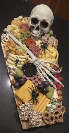 Do you love Halloween treats?! We're sharing 51 Halloween snack ideas in the form of snack boards and charcuterie trays you are going to be so inspired by! These are actually really simple to make and are so impressive! Halloween Charcuterie Board Lunch, Halloween Meat Tray, Skull Charcuterie Board, Spooky Charcuterie Board, Halloween Buffet Table, Halloween Bunco, Halloween Platter, Halloween Snack Ideas, Charcuterie Trays