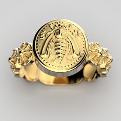 Discover this exquisite Italian Gold ring featuring a stunning reproduction of an ancient Greek Bee coin. This unique piece is not just jewelry; it's a work of art, handcrafted to order with the utmost care and precision. Bees served as a prominent symbol in Ephesos, an ancient Greek city situated on the western coast of Turkey. Ephesos held a significant role as a religious hub dedicated to the worship of the Greek goddess Artemis, and the imagery depicted on Ephesian coins consistently reinfor Luxury Coin-shaped Intaglio Jewelry, Luxury Carved Yellow Gold Signet Ring, Ceremonial 14k Gold Jewelry With Historical Design, 14k Gold Byzantine Round Ring, 14k Gold Byzantine Style Rings, 14k Gold Byzantine Style Round Rings, Luxury Yellow Gold Rings For Commemoration, Luxury Yellow Gold Commemoration Rings, Ancient Gold Collectible Rings