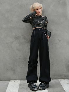 Elevate your edgy streetwear game with our Crisscross Straps Black Asymmetrical Wide Leg Pants. These statement pants feature a unique asymmetrical design that adds a modern twist to the classic wide-leg silhouette. The crisscross straps provide an eye-catching detail, while the detachable chains offer versatile styling options. Pair them with a fitted top and chunky boots for a complete, bold ensemble. Garment Size SizeSMLFull Length100102106Waist626670Hips909498Cuff474951Rise31.632.232.8 Edgy High Waist Pants For Streetwear, Alternative Style Club Bottoms With Belt Loops, Punk Style Wide Leg Bottoms For Concerts, Alternative Style Bottoms With Belt Loops For Club, Punk Style Party Pants With Belt Loops, Punk Style Pants For Party, Punk Style Pants With Belt Loops For Party, Edgy Wide Leg Bottoms For Streetwear, Edgy Wide-leg Bottoms For Streetwear