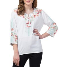 Raj Dahlia Tunic This elegant tunic is ready to make a statement with detailed floral embroidery and beautiful tassels to add on-trend interest. Pair with your favorite jeans and you're ready to go! Bohemian Spring Embroidered Tunic Top, Spring Bohemian Embroidered Tunic Top, Casual Tunic Top With Tassels, Bohemian Embroidered Top For Spring, Casual Floral Embroidered Tunic Top, Spring Folk Style Peasant Tunic Top, Floral Embroidered Top For Fall Vacation, Spring Folk Peasant Tunic Top, Spring Folk Tunic Peasant Top