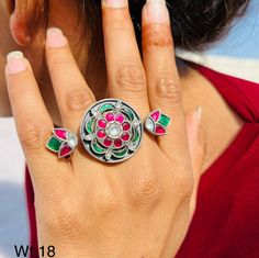 92.5 silver adjustable ring Contemporary/ruby and white color kundan  stones/oxidized silver Indian/western/Punjabi/Pakistani/Bangladeshi jewelry/ Invest in your self with silver pieces to keep it for generations with stylish elegant designs to showoff your style! Metal-92.5 sterling silver. Oxidized silver  Clear and turquoise kundan stones Weight 18 gm Silver Kundan Rings For Festive Occasions, Festive Silver Kundan Rings, Traditional Silver Meenakari Rings, Silver Kundan Toe Ring, Hand Set Kundan Ring In Silver, Silver Kundan Ring With Hand Set, Silver Kundan Ring With Hand Set Stones, Festive Silver Temple Jewelry Rings, Festive Silver Meenakari Rings