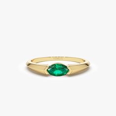 "Emerald Ring / 14k Gold Marquise Shape Natural Emerald Ring / Horizontal Set Marquise Genuine Emerald Ring by Ferkos Fine jewelry / May Birthstone *Made to Order *Gold Kt: 14K (also available in 18K) *Available Gold Color: Rose Gold, Yellow Gold, White Gold *Marquise Shape Emerald: 1 pc 6 x 3 MM *Emerald Carat Weight: 0.25 ctw * Ready to Ship in 7-10 Business Days If you have any additional questions about this ring, just hit the \"Message Ferko\" button and we will get back to you within a few Smaragd Ring, Natural Emerald Rings, Gold Armband, Local Jewelry, Solid Gold Rings, Emerald Jewelry, Sapphire Jewelry, Emerald Gemstone, Gold Wedding Band