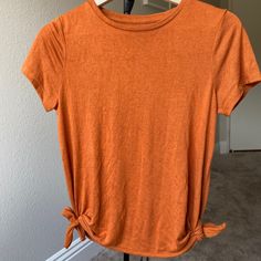 Soft, Orange T-Shirt With Ties On Both Sides. Great Quality, Never Worn. Stretch Orange T-shirt Casual Style, Stretch Cotton Orange T-shirt, Orange Stretch Cotton T-shirt, Tied T Shirt, Orange T Shirt, Soft Orange, Orange Tie, Orange T Shirts, Universal Thread