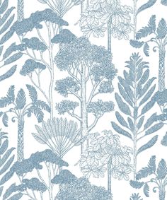 a blue and white wallpaper with trees, plants and leaves on the bottom half of it