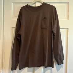 Nwot Nike Nike Casual Brown Tops, Casual Brown Nike Top, Nike Casual Solid Color T-shirt, Nike Casual Solid T-shirt, Casual Nike T-shirt, Casual Solid Nike T-shirt, Casual Solid Color Nike T-shirt, Nike Long Sleeve Cotton T-shirt, Casual Nike Tops With Pockets