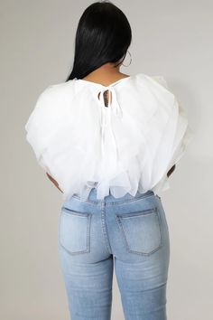 This cropped ruffle top is as flirty as it is flattering. The petal like details move flawlessly to reveal matching lining underneath. Pair with your favorite Jeans or dress it up with an elegant skirt. You can’t go wrong! Sizes: S-XXL Colors: Purple, White, Yellow, Pink, Black Tulle Tops, Ruffled Feathers, Chiffon Shorts, Ruffle Crop Top, Chiffon Fashion, Elegant Skirt, Round Neck Tops, Sleeveless Crop Top, Casual Lace