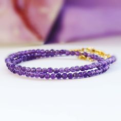 Tiny 3mm Amythyst Round Beaded Choker, Summer Choker, 14K Gold Plated Cross Pendant, Handmade Necklace, Natural Purple Gemstones, Gift for Her Materials: Natural Amethyst Beads, 14K Gold Plated Brass. Natural Amethyst Beads: 3mm Cross Pendant Size: 12mm x 6.8mm x 2.2mm Chain Extender Length: 2 inches Closure: Lobster Clasp ----------------------------------------------------------------------------------------------- ❤SHIPPING Processing Time: 1-3 days Shipping Day: Monday, Wednesday, Friday USP Dainty Purple Beaded Bracelets With Round Beads, Dainty Purple Beaded Bracelet With Round Beads, Dainty Purple Beaded Bracelet, Spiritual Purple Jewelry With Tiny Beads, Purple Bracelets With Spacer Beads, Violet Crystal, Purple Gemstones, Summer Choker, Purple Quartz