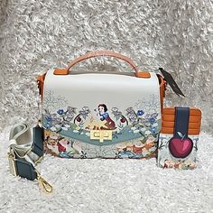 New Loungefly Disney Snowwhite And The Seven Dwarfs And Forrest Friends, Embroidered Florals Handbag / Shoulder Bag / Crossbody And Apple Cardholder. See Pictures For More Details And Measurements. Price Is Firm. Please Do Not Send Offers Unless Bundled With Other Items With A Reasonable Offer. Combine Orders Into A Bundle And Pay For Only One Shipping. C-65 White Travel Bag With Card Slots, Frozen Loungefly, Snow White Loungefly, Loungefly Alice In Wonderland, Pocahontas Loungefly, Loungefly Disney Wallets, Loungefly Bag, Snow White And The Seven Dwarfs, The Seven Dwarfs