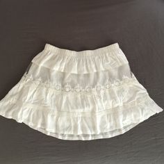 Delicate And Pretty 100% Cotton Skirt, 15.5" Long. Elastic Waistband Is 15.5" Laid Flat. In Excellent Condition, Never Worn. A Little Too Large For Me. White Ruffled Mini Skirt For Beach, Beach White Ruffled Mini Skirt, White Ruffled Skirt Skort For Vacation, White Ruffled Skort For Vacation, White Ruffled Skort For Summer, White Ruffled Skirt For Beach, White Ruffled Skirt Bottoms For Vacation, White Summer Mini Skirt For Beach, White Flowy Mini Skirt For Summer