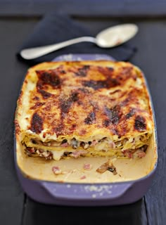 a casserole dish with meat and cheese